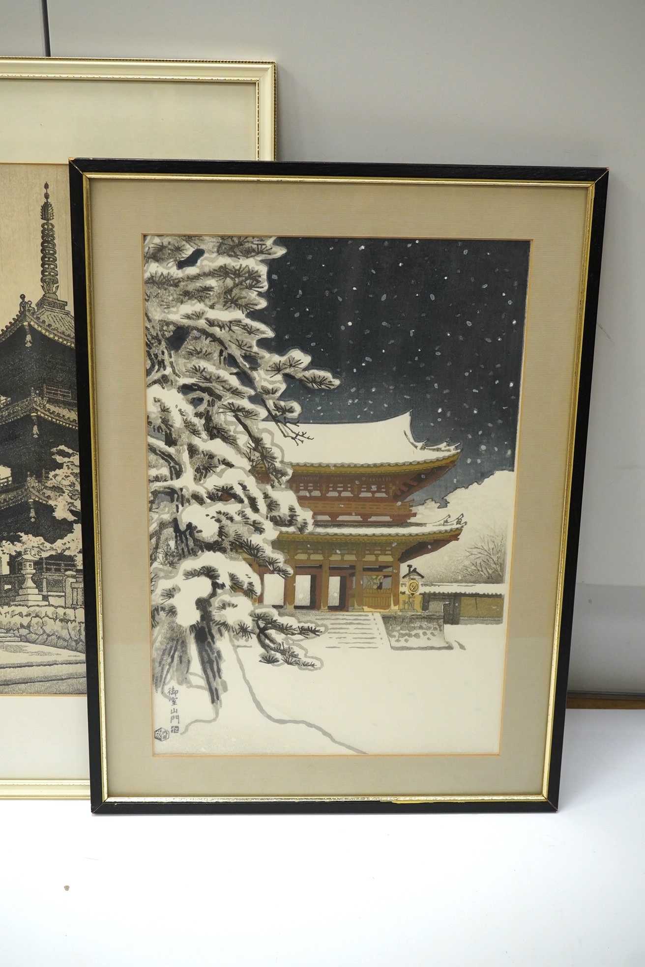 Nisaburo Ito (1905-2001), two pairs of Japanese woodblock prints, Pagodas, signed with character marks, largest each 39 x 26cm. Condition - fair to good, some minor discolouration